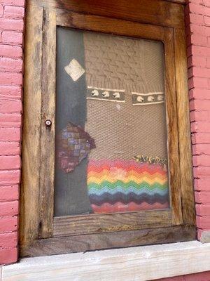 Wool Display on wall outside