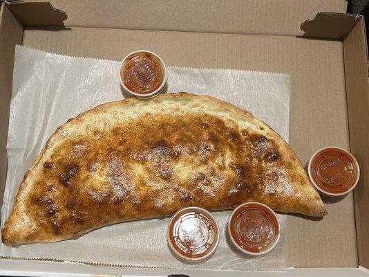 Family Calzone - no sauce, just ricotta, mozzarella; and added pepperoni ~$16.70. Marinara on the side. Looks a bit smaller.