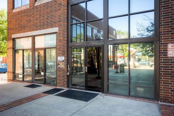 Main entrance to 1 Broadway. Pinnacle Real Estate Advisors located on the third floor.