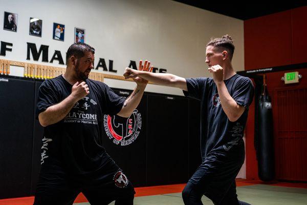 Father and son karate team.