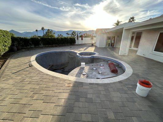 Pool remodel new coping,tile,and pavers