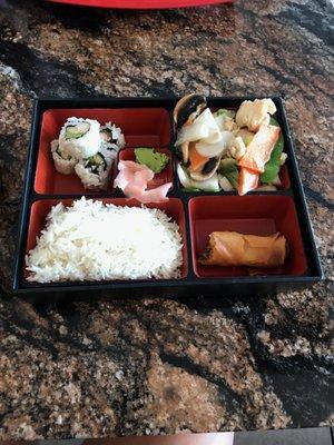 Classic Bento Box with Moo Goo Gai Pan, Vegetable Spring Roll and California Roll. (Excuse my half eaten spring roll. LOL)