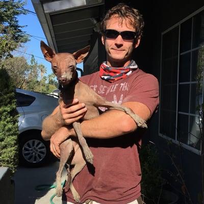 Will and our muddy dog post-hike.