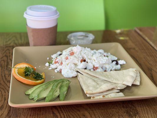 Greek Scramble and coffee with a side of almond milk.