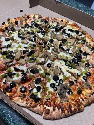 Mushrooms, black olives and green peppers galore!