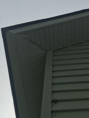 He spent hours putting in this soffit before moving to the back, he tucked a piece over the old section instead of finishing the corner