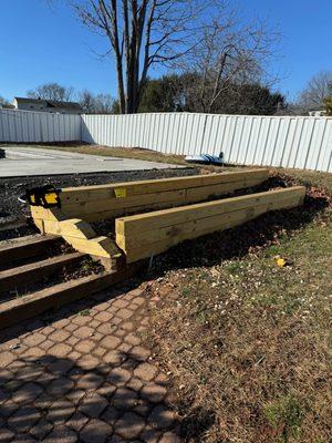 4x4x12 garden upgrade to 6x6x16 with a half a splash of stone dust on the backside of the garden bed.