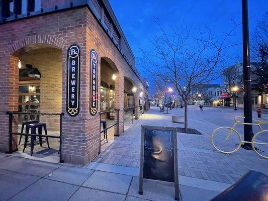 Outside. Sidewalk view.