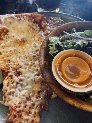 Equator pizza slice and salad