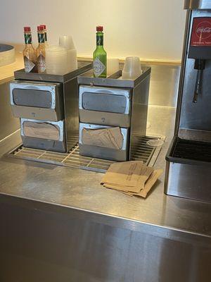 Empty napkin holders and clutter. The bathroom is also a scary place.