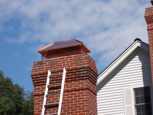 Beautiful copper chimney cap.