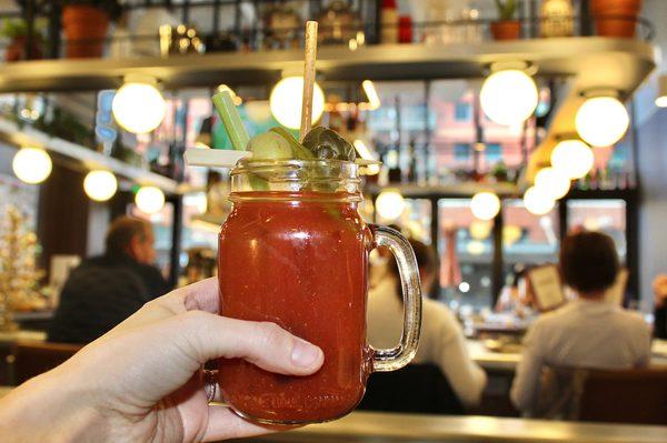 The "People's Choice" Bloody Mary is made with pepper Infused Vodka, Harissa, Horseradish and Herb Mix, Bacon, Pickled Okra, and Giardiniera