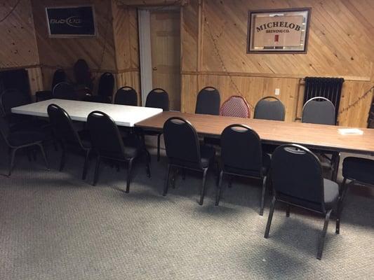 Strange collection of tables and chairs in the back room.