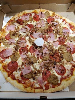 Canadian bacon,  Pepperoni, and sausage pizza