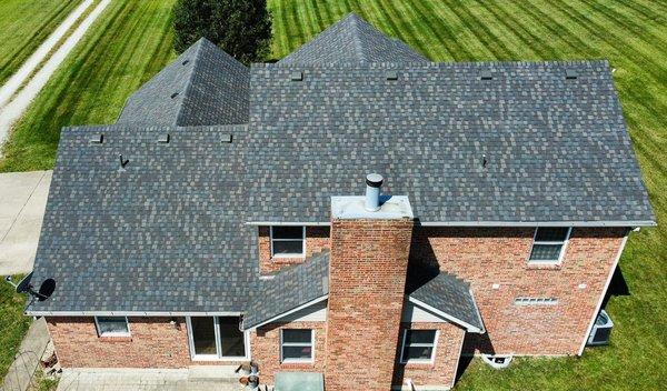 Aerial image of a home in Franklin, Ohio, with a newly completed roof replacement using CertainTeed Landmark Driftwood shingles