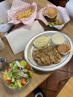 Chicken Fried Steak with side salad and mashed potatoes, Hamburger & fries Delicious!!