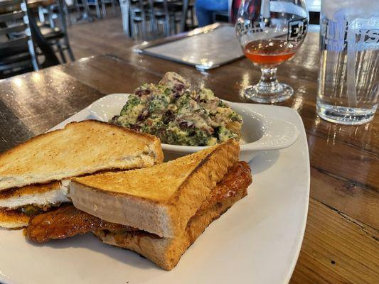 Tennessee honey chicken sandwich with a side of broccoli salad.