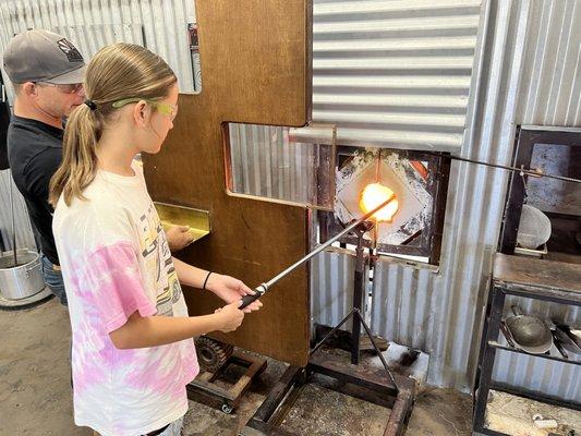 Turning the glass in the furnace