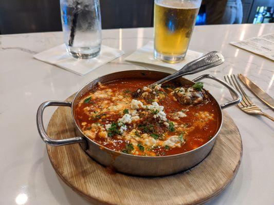 Keftedakia. Meatballs, tomato sauce and feta.