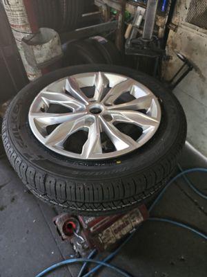 Tire and tire change machine