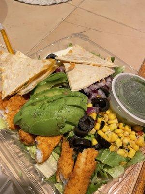 Avocado salad with fish taco chunks