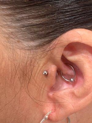 Tragus and Daith piercing