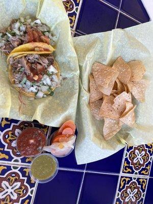 Two tacos, chips, and salsa. With drink it's a $10 meal.