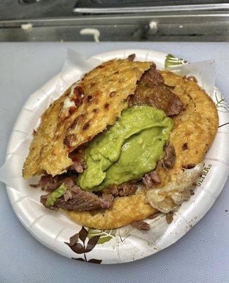 Our newest item, the gordita, loaded with your choice of meat and topped with lettuce, crema, and salsa.