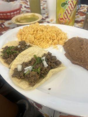 Fajita tacos on fresh corn tortilla.