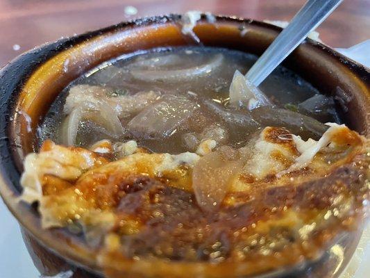 French onion soup. Underdone onions and bland flavor.