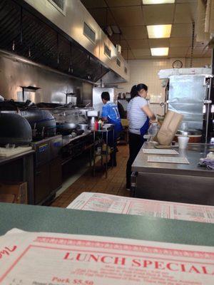 From the front counter into the kitchen.