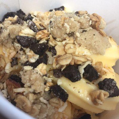 Vanilla yogurt with cookie dough, Oreo crumbles, granola and coconut :)