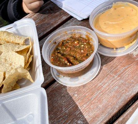 Chips, salsa (spicy!!) and queso.