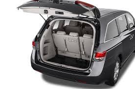 New 8 passenger Honda Odyssey with deep cargo space.