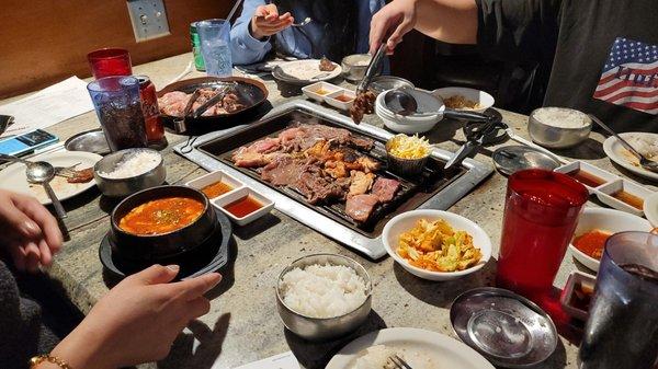 A mix of Korean BBQ sizzling making our mouths water as we watch the grilling. Everything they serve is edible and very  Delicious.