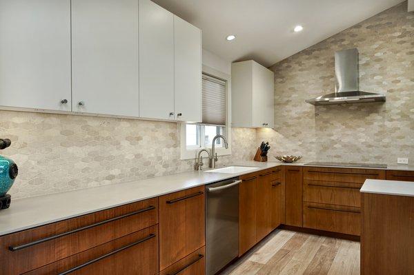 A mix of walnut and white for this new modern kitchen