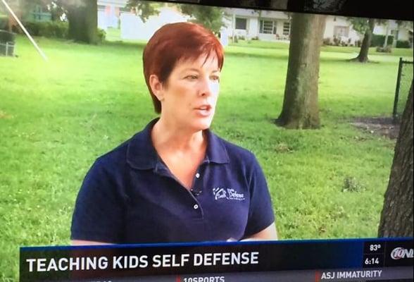 Kathy speaking to a Channel 10 reporter in June 2016-about the abduction attempt of a teen girl with her mom present.