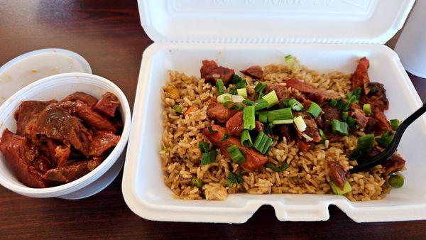 Large portion of BBQ pork fried rice with a side of pork