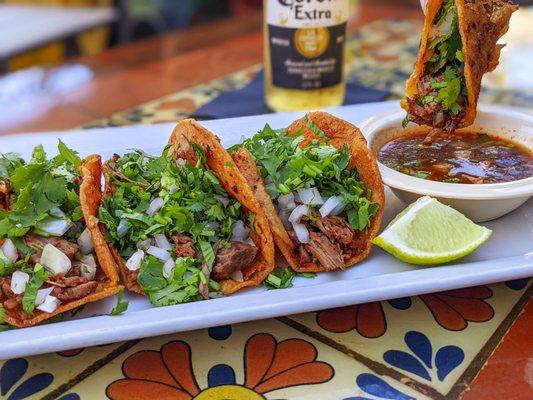 Did you know we have Tacos de Birria? Try our best-selling tacos made with braised beef, cilantro, and onions on corn tortillas! A delight!