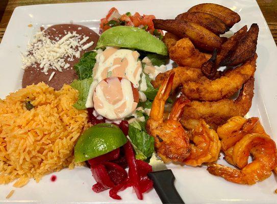 Camarones y platanos con arroz y frijoles y ensalada. It was so delicious and so much food we have enough to take home for another meal!