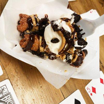 Peanut butter topped with Hot Fudge, Oreos and ice cream.