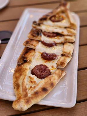 Spicy sausage pide