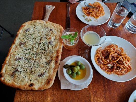 Happy hour! Golden potato pizza, Bucatini Amatriciana, olives