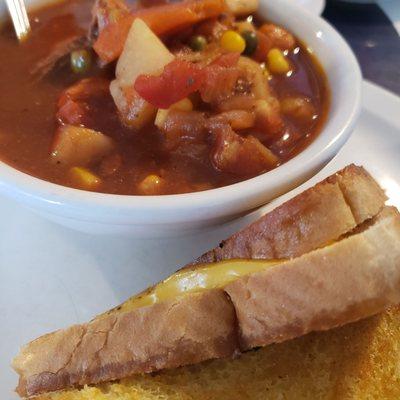 Vegetable soup with grilled cheese.