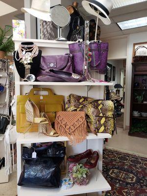 More, designer purses, shoes, and accessories in every color.