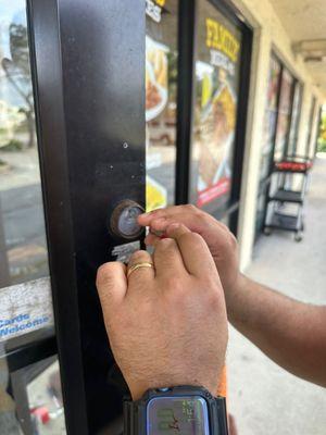 Technician working on replacing the mortise lock. (Business)