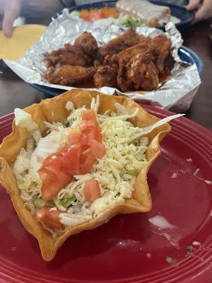 Beef Taco Salad and Chicken Wings (10) both was very good.