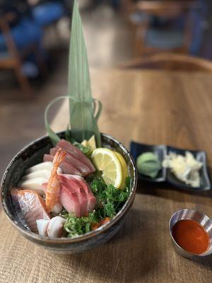 Chirashi don w sriracha sauce on the side. The rice was seasoned w furikaki. Nice touch!