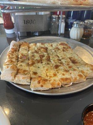 Breadsticks with dipping marinara sauce