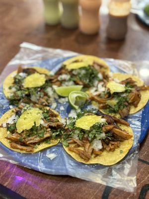 Al pastor tacos on corn tortillas